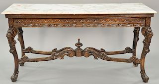 Carved hall table with faces and marble top. ht. 31 1/2 in., top: 21 1/2" x 61 1/2"