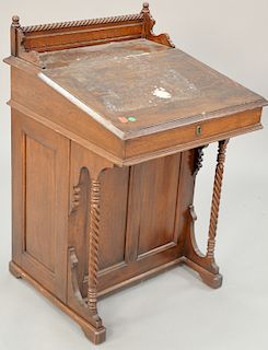 Oak Davenport desk with gallery. ht. 35 1/2 in., wd. 23 in.