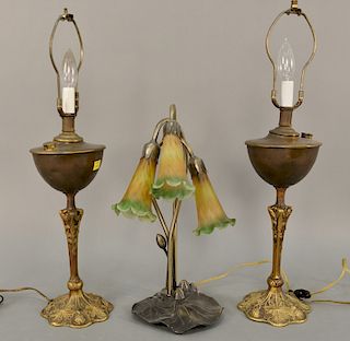 Seven table lamps to include bouillotte style lamp with tole shade, lily Tiffany style lamp, pair of lamps with oil fonts, two large...