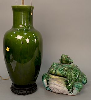 Eight piece ceramic group to include two blue and white urns made into table lamps, green glazed frog ht. 9 in., yellow glazed urn, and fo...