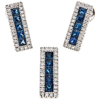 A sapphire and diamond 18K white gold pendant and pair of stud earrings set.