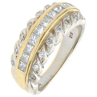 A diamond 18K white and yellow gold ring.