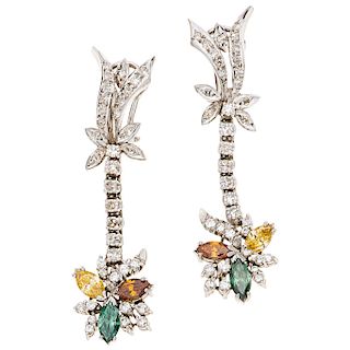 A diamond 14K white gold pair of earrings.