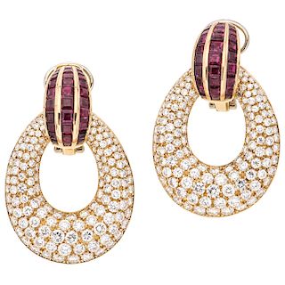 A ruby and diamond 18K yellow gold pair of detachable earrings.