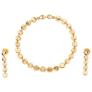 TANE, TIKAL 18K yellow gold bracelet and pair of earrings set.