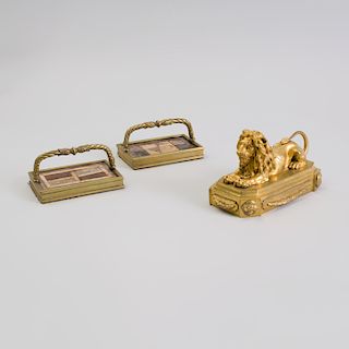 Regency Gilt Bronze Lion-Form Paperweight and a Pair of Gilt-Metal-Mounted Specimen Marble Weights