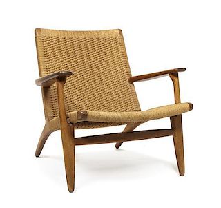 A Hans Wegner CH25 Teak Lounge Chair, for Carl Hansen & Son Odense, Height 28 x width 27 1/2 x depth 20 inches.