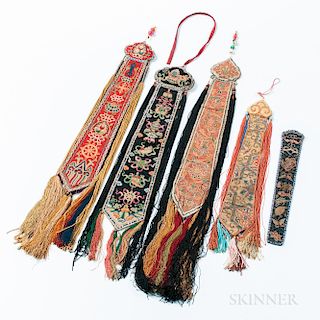 Four Embroidered Tassels and a Fan Case