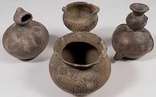 A COLLECTION OF FOUR POTTERY VESSELS