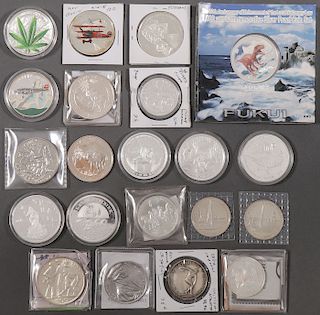 21 FOREIGN SILVER COMMEMORATIVES