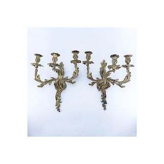 Pair of French Louis XV/Rococo Style Three Arm Gilt Bronze Wall Sconces. One has been professionall