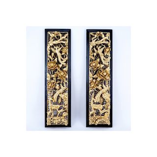 Pair of Chinese Giltwood Deep Relief Carved Panels. A few small nicks to relief on one panel, light