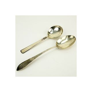 Grouping of Two (2) Sterling Silver Serving Spoons. Includes: Tiffany & Co. "Faneuil" vegetable ser