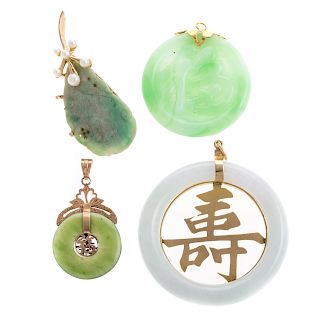 A Trio of Jade Pendants and a Jade Pin