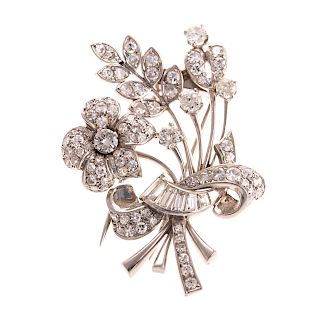A Ladies Vintage Diamond Floral Brooch in Platinum