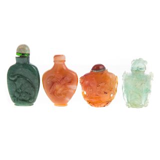 Four Chinese Carved Hardstone Snuff Bottles