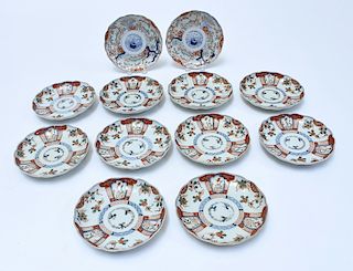 Twelve Japanese Imari scalloped plates