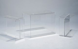 Three Lucite tables: pair end tables