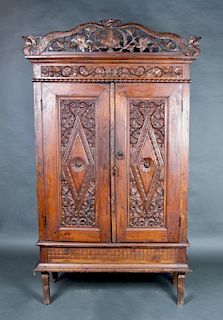 Intricately Carved Wood Cabinet