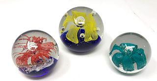 Three Floral Art Glass Paperweights 