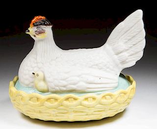 CONTINENTAL BISQUE PORCELAIN TWO-PIECE BOX IN THE FORM OF A NESTING HEN
