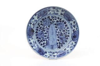A CHINESE BLUE AND WHITE 'ROCK GARDEN' DISH