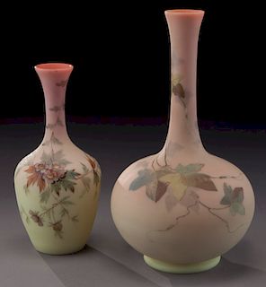 (2) Burmese glass stick vases,