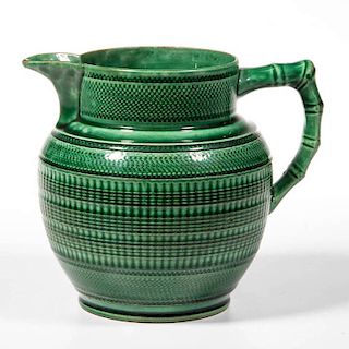 ENGLISH STAFFORDSHIRE POTTERY ENGINE-TURNED AND MOLDED GREEN-GLAZED PITCHER