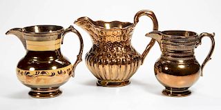 ENGLISH STAFFORDSHIRE POTTERY COPPER LUSTER PITCHERS, LOT OF THREE