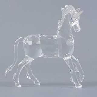 Unicornio. Austria. Siglo XX. Elaborado en cristal Swarovski. Diseño facetado. Cuenta con caja original.