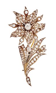 A Silver Topped Rose Gold and Diamond Flower Brooch, 11.50 dwts.