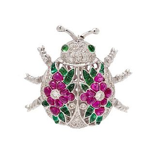 An 18 Karat White Gold, Ruby, Emerald and Diamond Articulated Insect Brooch, 5.00 dwts.