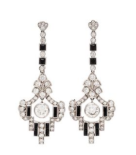 A Pair of Platinum, Diamond and Onyx Pendant Earrings, 7.00 dwts.