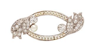 An Art Deco Platinum, Diamond, Pearl and Seed Pearl Brooch, 7.70 dwts.