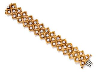 An 18 Karat Yellow Gold, Platinum and Diamond Bracelet, 46.10 dwts.
