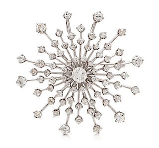 A Platinum, White Gold and Diamond Pendant/Brooch, 13.40 dwts.