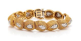 An 18 Karat Yellow Gold, Platinum and Diamond Bracelet, David Webb, 28.30 dwts.
