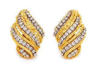 A Pair of 18 Karat Bicolor Gold and Diamond Earclips, 16.60 dwts.