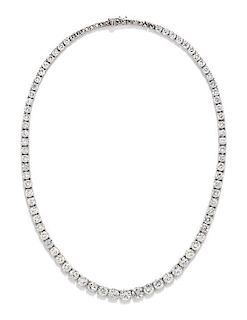 A Platinum and Diamond Riviere Necklace, 26.30 dwts.