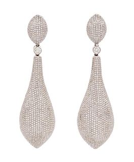 A Pair of 18 Karat White Gold and Diamond Earclips, 23.10 dwts.