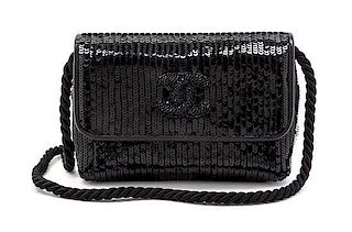 * A Chanel Black Leather and Sequin Flap Bag, 6 1/2 x 4 1/2 x 3 inches.