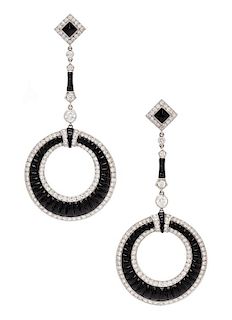 A Pair of 18 Karat White Gold, Diamond and Onyx Earrings, 10.00 dwts.