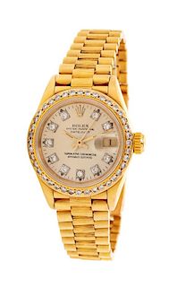 * An 18 Karat Yellow Gold and Diamond Ref. 69278 'Oyster Perpetual Datejust' Wristwatch, Rolex, 45.00 dwts.