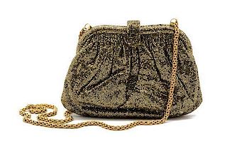 * A Chanel Gold Glitter Evening Bag, 7 1/2 x 4 1/2 x 1 1/2 inches.
