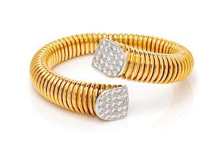 An 18 Karat Bicolor Gold and Diamond Tubogas Cuff Bracelet, Micheletto, 41.50 dwts.