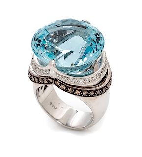 An 18 Karat White Gold, Aquamarine, Diamond and Colored Diamond Ring, 17.23 dwts.