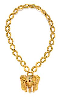 * An 18 Karat Yellow Gold, Diamond, Emerald and Ruby Elephant Pendant/Brooch Necklace, 115.40 dwts.