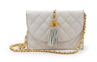 * A Chanel White Quilted Lizardskin Bag, 8 x 5 1/2 x 2 1/2 inches.