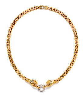 * An 18 Karat Bicolor Gold and Diamond Panther Motif Necklace, 29.85 dwts.