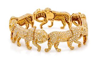 * An 18 Karat Yellow Gold, Diamond and Colored Diamond Panther Bracelet, 47.95 dwts.
